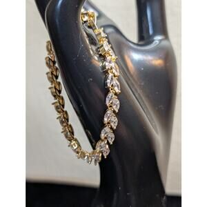 Gold Tone CZ Leaf 7" Long Tennis Bracelet W/ Fold Over Clasp